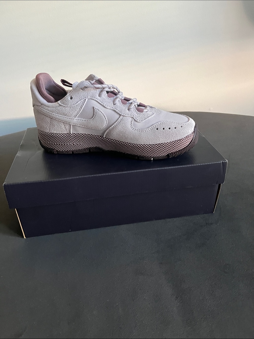 Nike Women’s Light Gray Suede Low-Top Sneakers